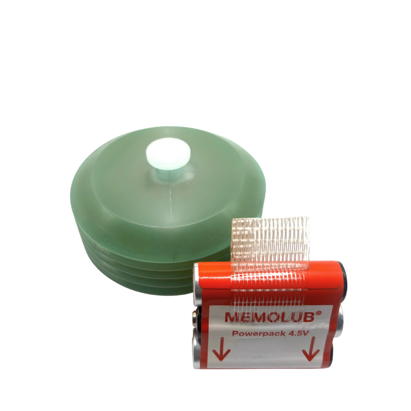 Memolub refill with Premalube and 4.5V battery pack